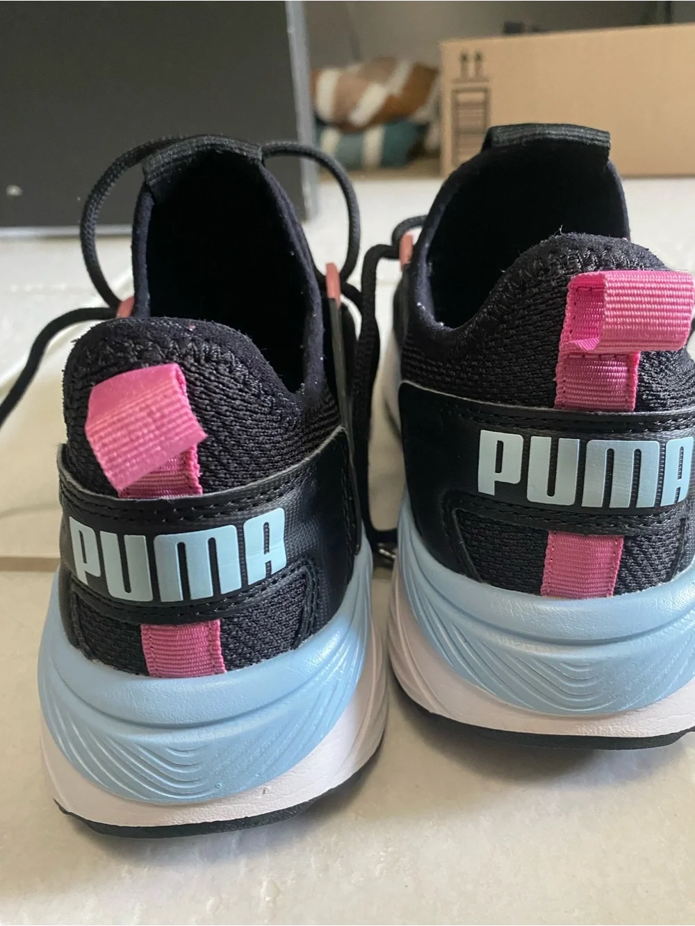 Puma black sneakers
